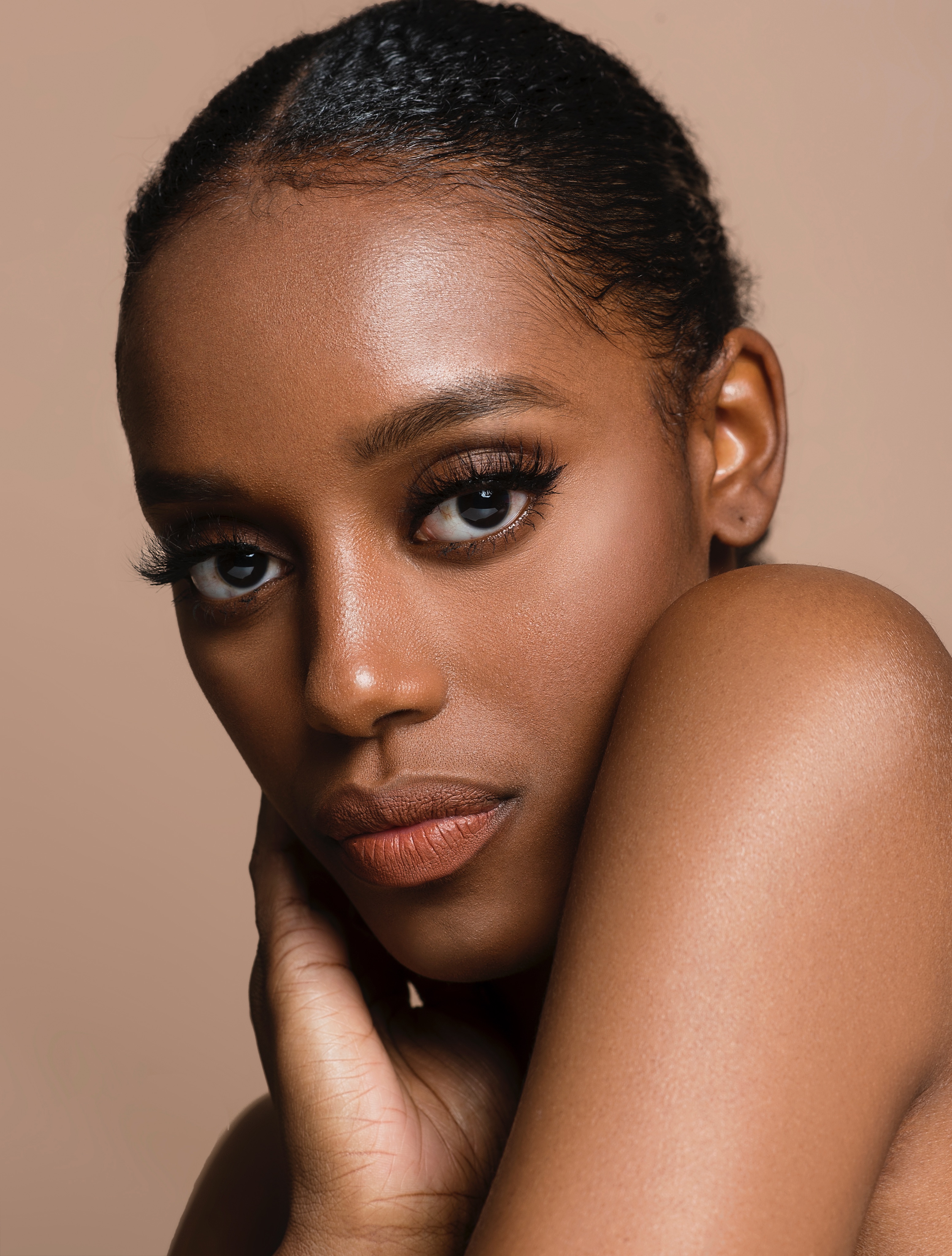 Portrait of a woman with radiant melanated skin