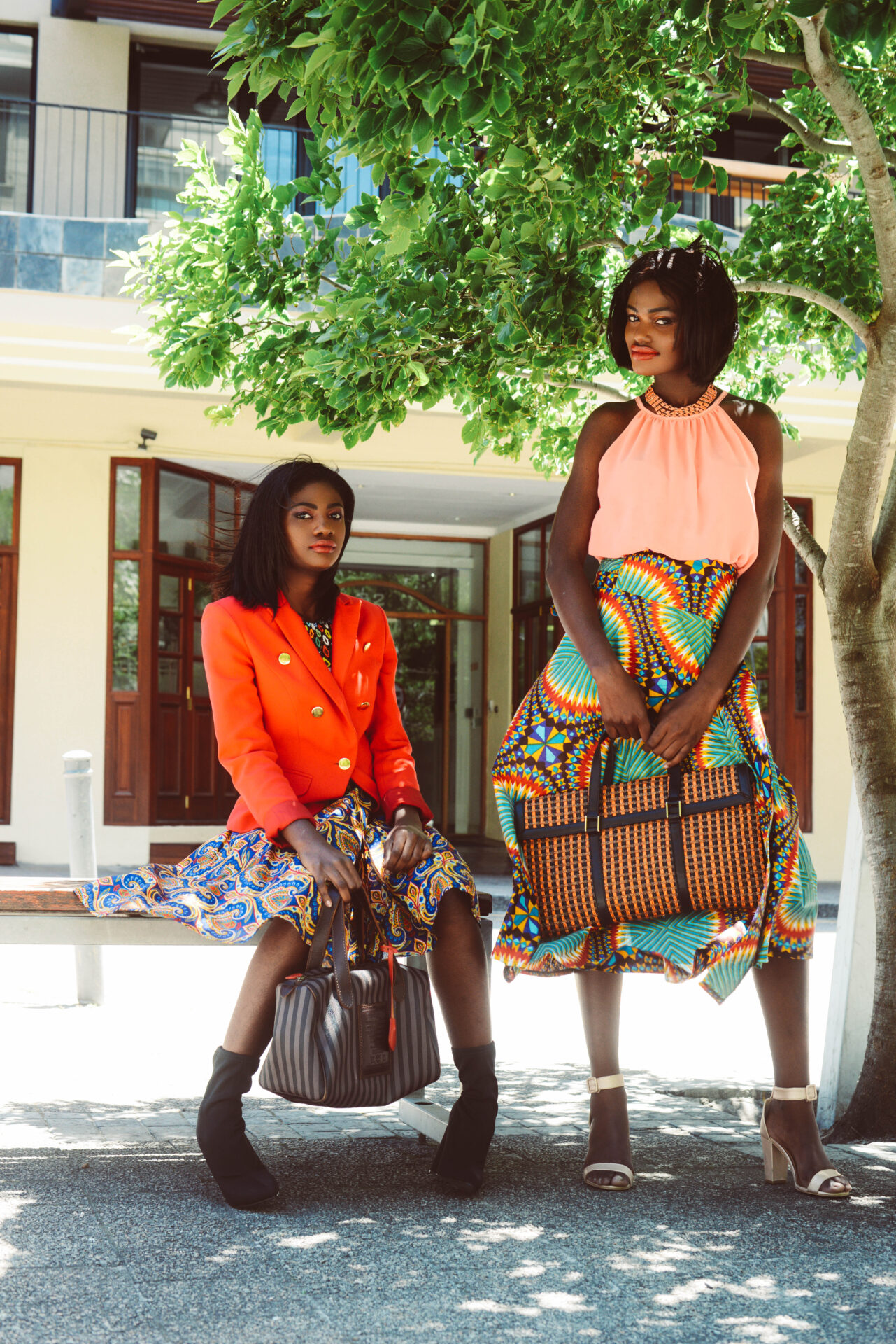 Red blazer over ankara print skirt